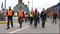 Crippling bus strike heads towards third week as talks continue