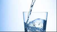 A Glass of water on white background