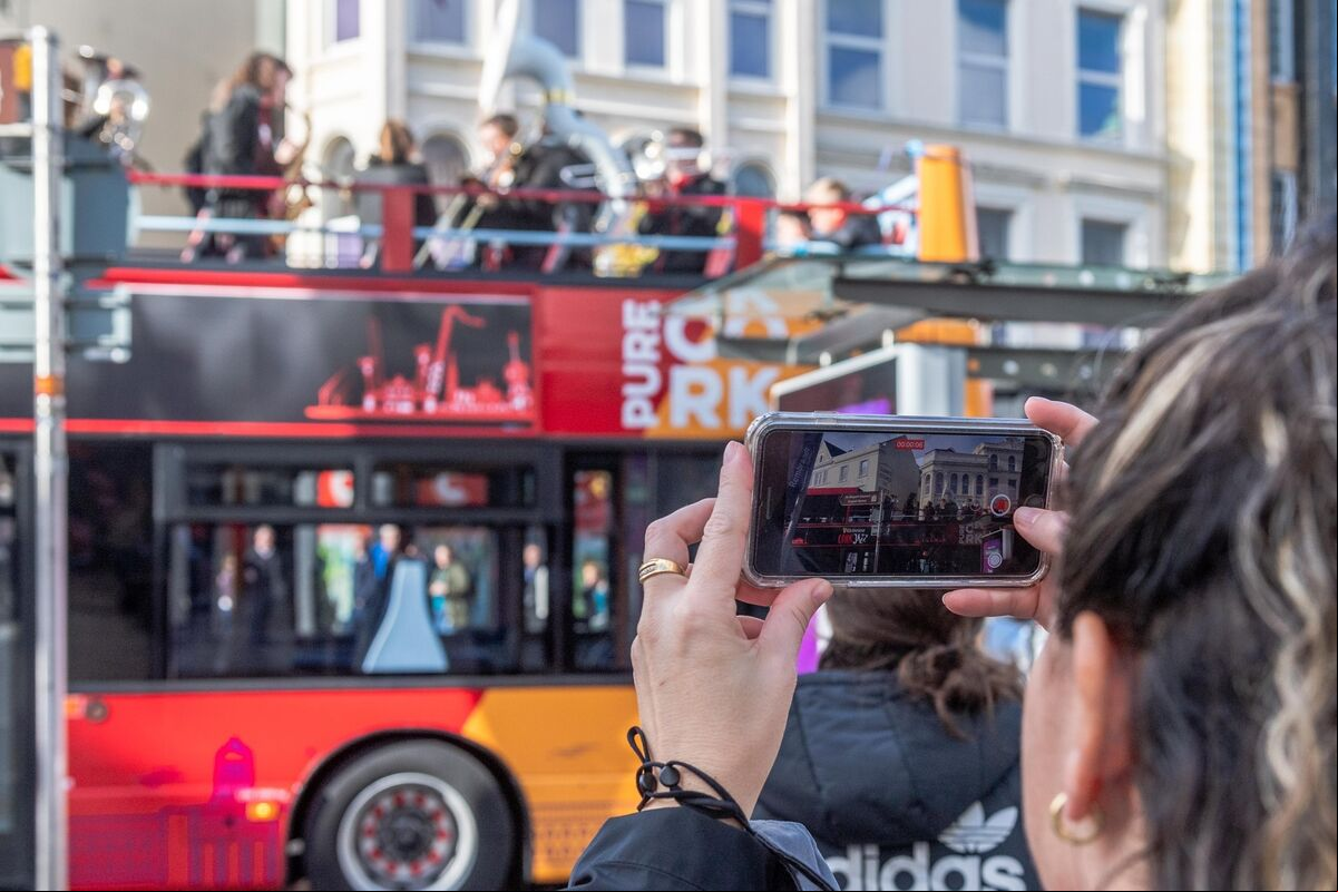 The 'Rebel Brass' band played on an open top bus on Patrick Street in front of huge crowds. Picture: Andy Gibson.