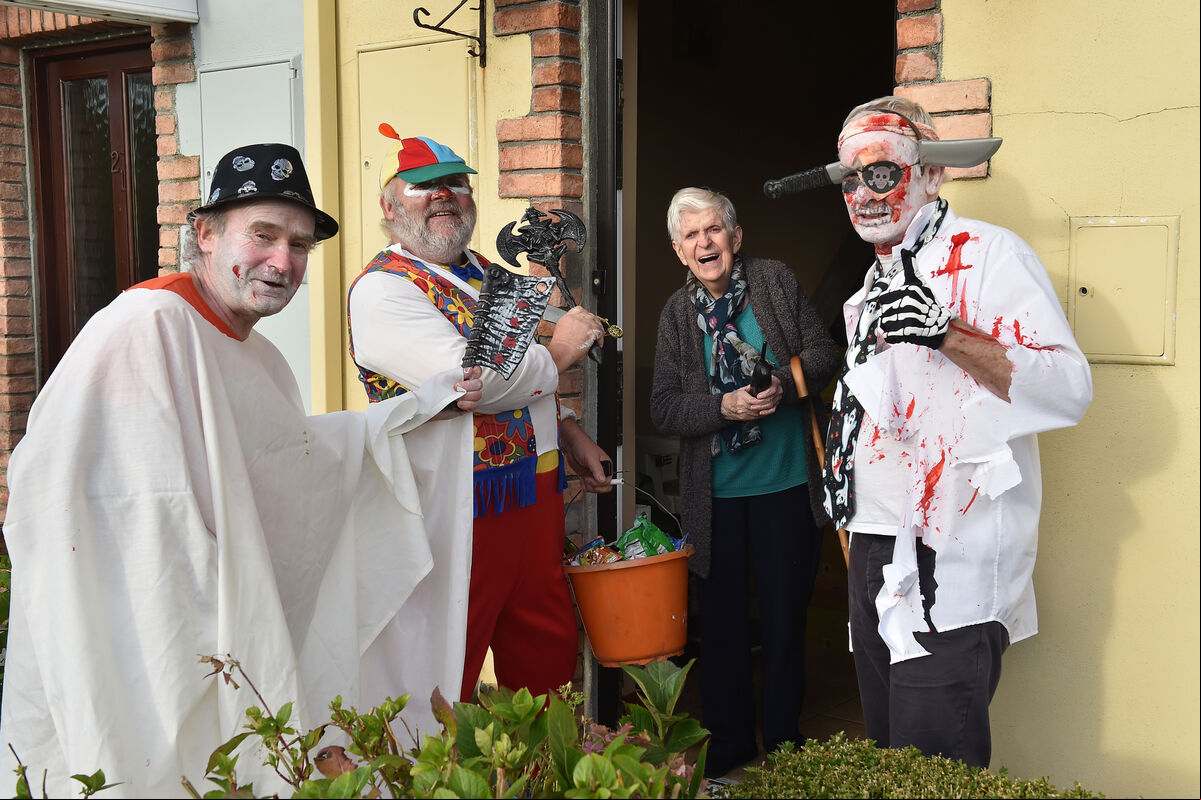 Cork's oldest trick-or-treaters Martin Murphy, Con Prout and John A. Murphy who have been trick-or-treating together for decades calling to Joan Cronin in Crossbarry, Co Cork. Picture Dan Linehan Cork's oldest trick-or-treaters Martin Murphy, Con Prout and John A. Murphy who have been trick-or-treating together for decades calling to Joan Cronin in Crossbarry, Co Cork. Picture Dan Linehan