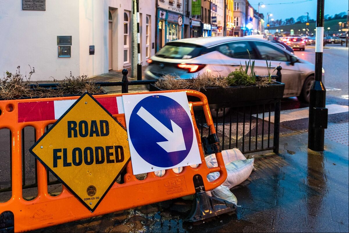 Cork County Council employees have 'Road Flooded' signs ready in case Storm Eunice floods Bantry Square on Friday morning. Met Éireann has issued a Red Weather Warning for wind, with gusts of up to 130KMH expected. Picture: Andy Gibson. Cork County Council employees have 'Road Flooded' signs ready in case Storm Eunice floods Bantry Square on Friday morning. Met Éireann has issued a Red Weather Warning for wind, with gusts of up to 130KMH expected. Picture: Andy Gibson.