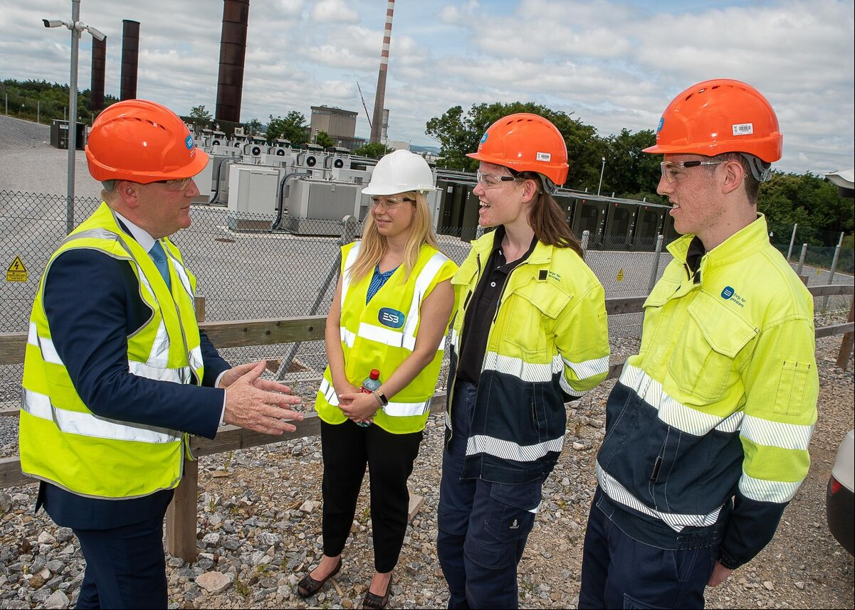 Pictured (left to right) is Minister for Public Expenditure and Reform, Michael McGrath TD talking to Joanna Spirodek, Fluence with Ciara Beechinor and Gavin Kirrane, ESB Aghada Interns at the official opening of a major battery plant at Aghada Power Station, Whitegate, East Cork which will add 19MW (38MWh) of fast-acting energy storage to help provide grid stability and deliver more renewables on Ireland’s electricity system. Picture. John Allen