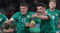 John Egan celebrates scoring his sides first goal with Jason Knight 27/9/2022