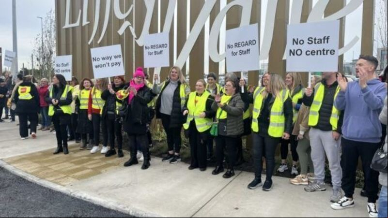 Staff at Liffey Valley Shopping Centre protest against new parking charges Staff at Liffey Valley Shopping Centre protest against new parking charges