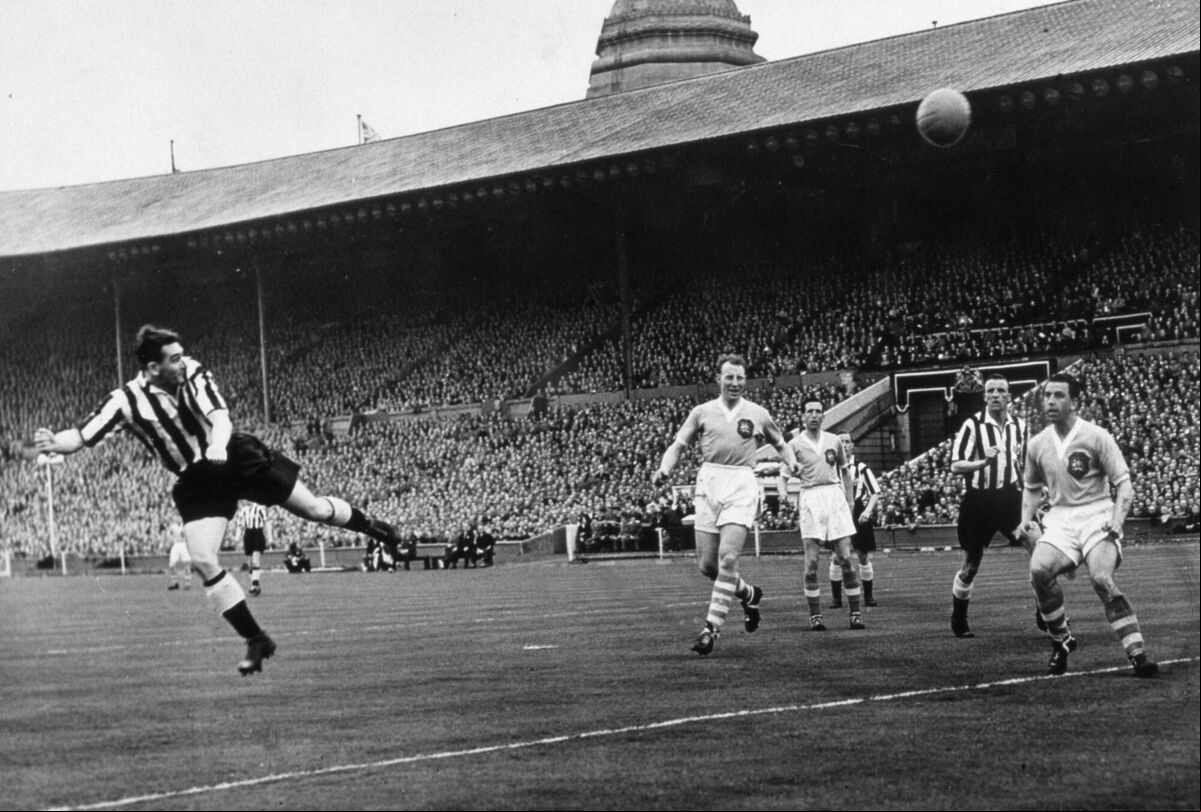 Newcastle United's Jackie Milburn, left, scores his first minute goal against Manchester City in the May 7, 1955, FA Cup Final at Wembley. Picture: Popperfoto/Getty Images Newcastle United's Jackie Milburn, left, scores his first minute goal against Manchester City in the May 7, 1955, FA Cup Final at Wembley. Picture: Popperfoto/Getty Images