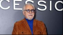 Brian Cox ‘got under the covers after a chair rocked across his room’