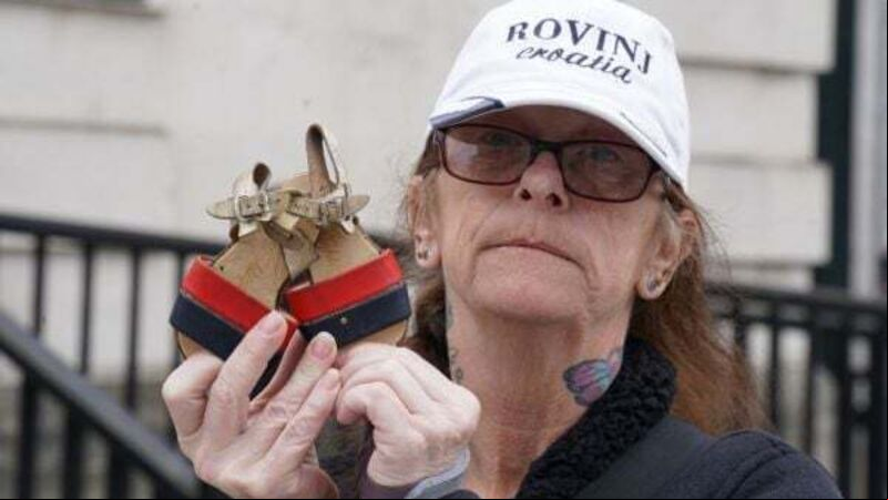 Bereaved family lay shoes of loved ones in protest against legacy Bill Bereaved family lay shoes of loved ones in protest against legacy Bill