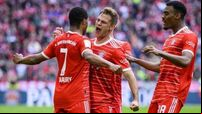 Bundesliga title battle continues as Bayern and Borussia Dortmund ease to wins