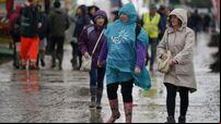 Crowds brave wet and windy weather at National Ploughing Championships
