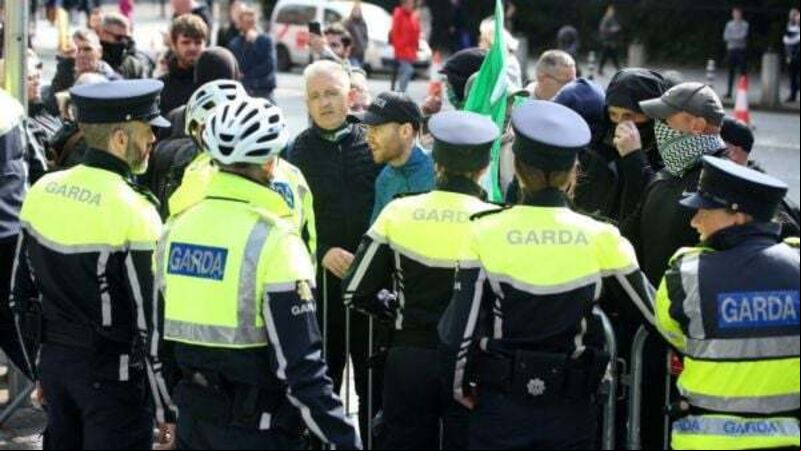 Gardaí escort TDs to safety amid demonstration outside Leinster House as Dáil resumes Gardaí escort TDs to safety amid demonstration outside Leinster House as Dáil resumes