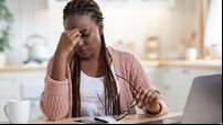Eyes Strain. Overworked Black Freelancer Woman Tired After Using Laptop In Kitchen
