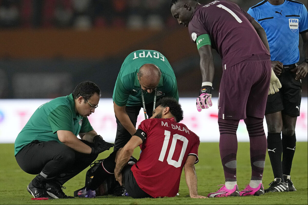 Egypt's Liverpool winger Mohamed Salah receives medical treatment during the African Cup of Nations Group B soccer match between Egypt and Ghana in Abidjan, Ivory Coast. Picture: AP Photo/Themba Hadebe Egypt's Liverpool winger Mohamed Salah receives medical treatment during the African Cup of Nations Group B soccer match between Egypt and Ghana in Abidjan, Ivory Coast. Picture: AP Photo/Themba Hadebe