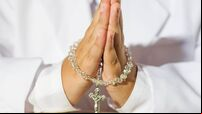 Close up of boy praying