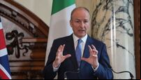 McEntee's figure for asylum seekers from North not based on evidence, Tánaiste says