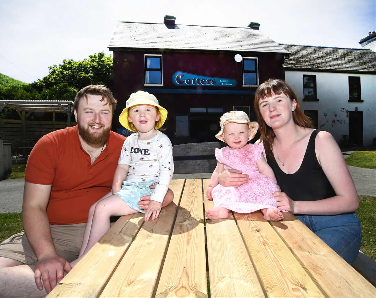 Roisin O'Connell of Cotter's Bar, Cape Clear Island, Co Cork with partner Cian McCann and children Saorlaith-Ré and Caoilfhionn, outside the public house. Picture: Larry Cummins Roisin O'Connell of Cotter's Bar, Cape Clear Island, Co Cork with partner Cian McCann and children Saorlaith-Ré and Caoilfhionn, outside the public house. Picture: Larry Cummins