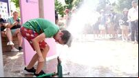 Olympic athletes and fans struggle to stay cool as Paris temperatures soar