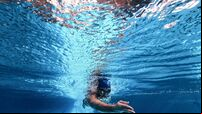 Swimmer in swimming pool