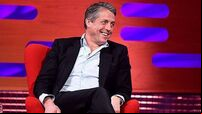 Hugh Grant on doing shots with Travis Kelce at Taylor Swift gig: We went crazy