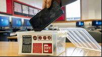 Phone pouches spark intense debate in last Leaders’ Questions