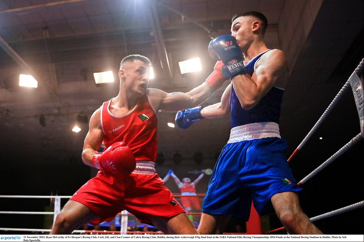 Ryan McCarthy of Fr Horgan's Boxing Club, Cork, left, and Cian Cramer of Cabra Boxing Club, Dublin, during their welterweigh 67kg final bout at the IABA National Elite Boxing Championships 2024 Finals at the National Boxing Stadium in Dublin. Photo by Seb Daly/Sportsfile Ryan McCarthy of Fr Horgan's Boxing Club, Cork, left, and Cian Cramer of Cabra Boxing Club, Dublin, during their welterweigh 67kg final bout at the IABA National Elite Boxing Championships 2024 Finals at the National Boxing Stadium in Dublin. Photo by Seb Daly/Sportsfile