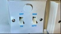 Warring couple in court over use of immersion switch