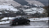 Chance of snow before Christmas as strong winds cause travel disruption