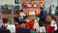 Surprise visitor to weekly Mayfield story time event