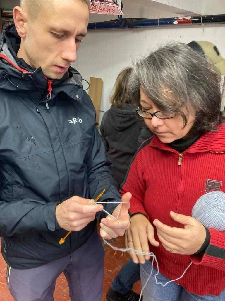 K teaching Paul how to knit at a Cork Repair Café event. K was prompted to develop the idea for the project as a result of her own experiences around trying to source repair shops locally. K teaching Paul how to knit at a Cork Repair Café event. K was prompted to develop the idea for the project as a result of her own experiences around trying to source repair shops locally.