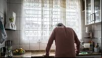Senior man feeling pain at home
