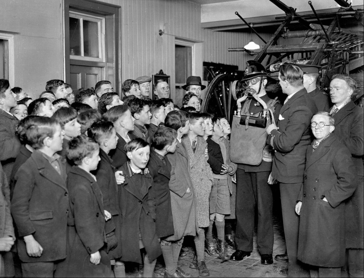 Catholic boy scouts at a gas mask demonstration at Cork Fire Station on Sullivan’s Quay in 1938. Catholic boy scouts at a gas mask demonstration at Cork Fire Station on Sullivan’s Quay in 1938.