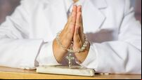 Close up of boy praying