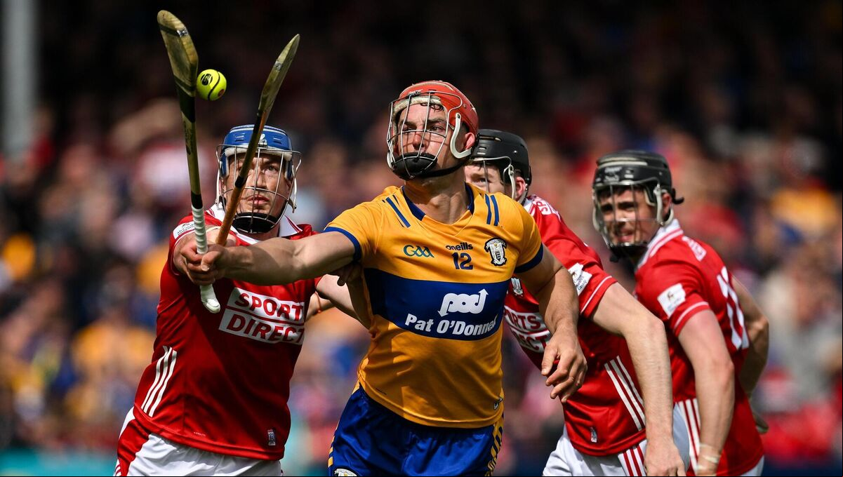 Peter Duggan of Clare in action against Cork players Seán O’Donoghue, Eoin Downey and Darragh Fitzgibbon. Picture: Brendan Moran/Sportsfile Peter Duggan of Clare in action against Cork players Seán O’Donoghue, Eoin Downey and Darragh Fitzgibbon. Picture: Brendan Moran/Sportsfile