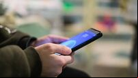 Child boy playing games on a smartphone,kids education technology,addiction