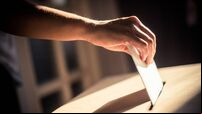 Conceptual image of a person voting during elections