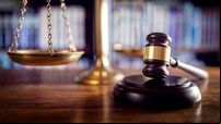 Gavel, scales of justice and law books