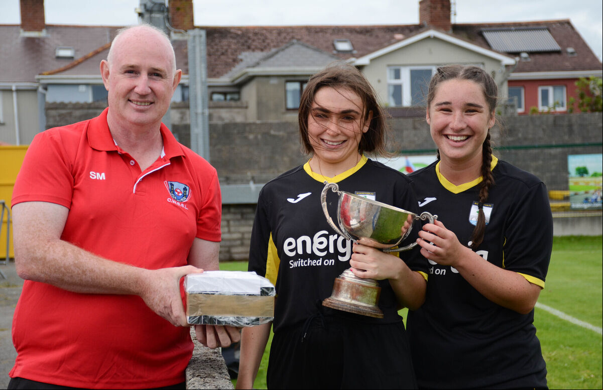 Stephen Mulcahy, CWSSL, presents the CWSSL Challenge Cup to Riverstown t captains Shannon Carson and Aoife O'Brien following their teams victory over Wilton in the final played in St Colman's Park. Picture: Howard Crowdy Stephen Mulcahy, CWSSL, presents the CWSSL Challenge Cup to Riverstown t captains Shannon Carson and Aoife O'Brien following their teams victory over Wilton in the final played in St Colman's Park. Picture: Howard Crowdy