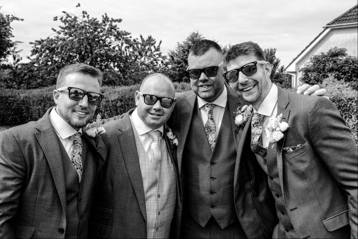 Stephen and his groomsmen taking some time out. Stephen and his groomsmen taking some time out.