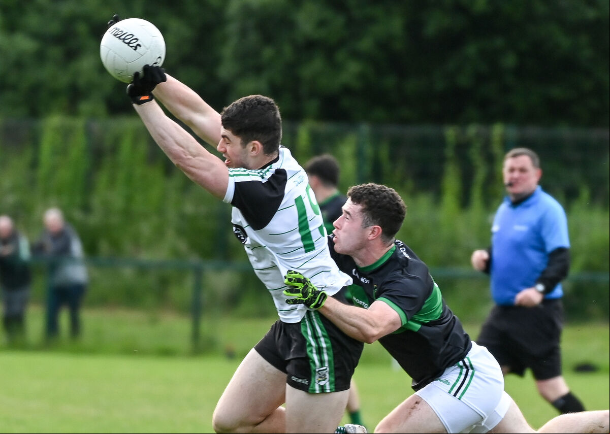 Douglas' Chris O'Keeffe is tackled by Nemo Rangers' Daniel Quinn, during their SFL clash at Douglas. Picture: David Keane Douglas' Chris O'Keeffe is tackled by Nemo Rangers' Daniel Quinn, during their SFL clash at Douglas. Picture: David Keane