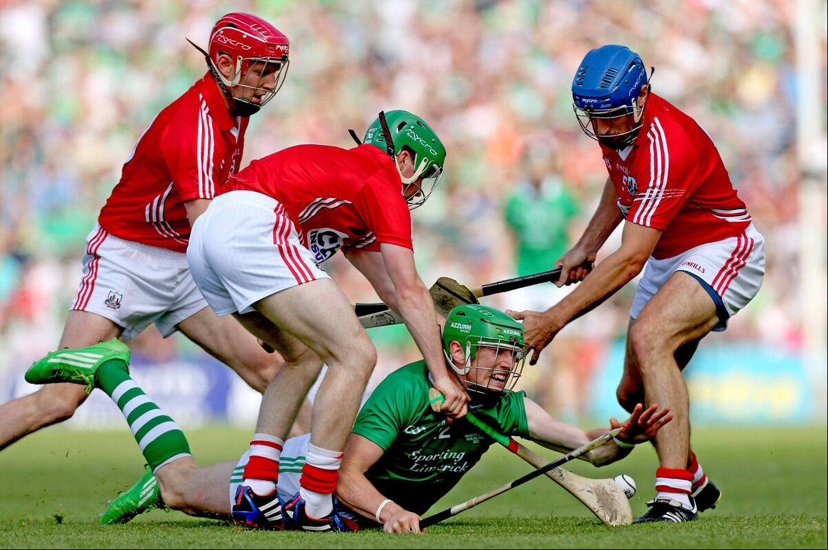 Cork's Lorcán McLoughlin, Tom Kenny and Daniel Kearney tackle Seamus Hickey of Limerick during the 2013 Munster hurling final. Picture: ©INPHO/James Crombie Cork's Lorcán McLoughlin, Tom Kenny and Daniel Kearney tackle Seamus Hickey of Limerick during the 2013 Munster hurling final. Picture: ©INPHO/James Crombie