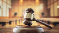 Judges gavel in courtroom legal trial and law background