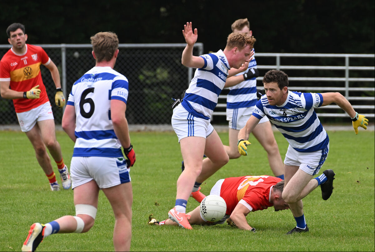 Castlehaven players Johnny O'Regan and Robbie Minihane get the better of Brian Hurley of Éire Óg. Picture: Dan Linehan Castlehaven players Johnny O'Regan and Robbie Minihane get the better of Brian Hurley of Éire Óg. Picture: Dan Linehan