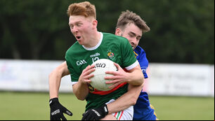<p>Clonakilty's Ross Mannix is tackled by Carrgaline's Nathan O'Keeffe during the McCarthy Insurance Group FL Division 1 game on Sunday. Picture: Eddie O'Hare</p>