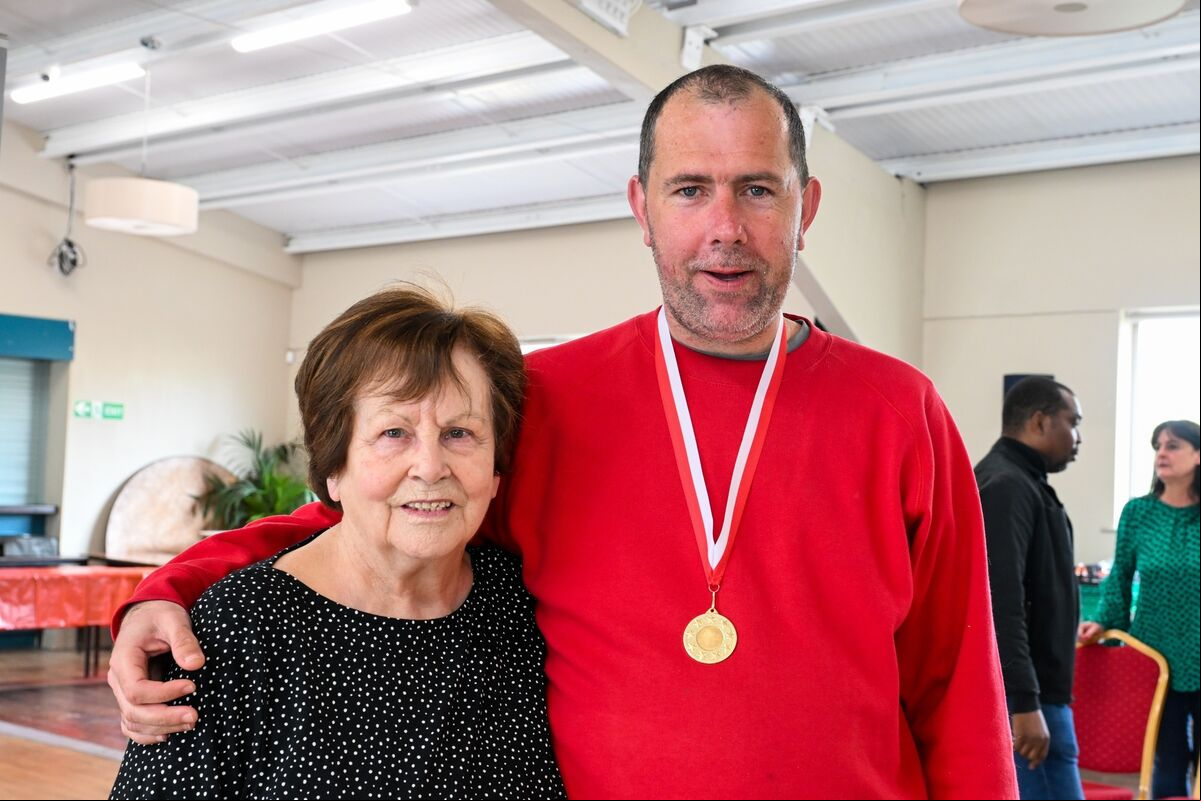 Phil Goodman with RehabCare's David Hogan at the annual Young at Heart kurling competition. Phil Goodman with RehabCare's David Hogan at the annual Young at Heart kurling competition.