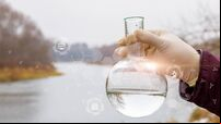 Testing the water of a reservoir for the content of microbes .