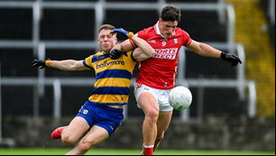 <p>Cork's Colm O'Callaghan battles for the ball against Ronan Daly of Roscommon at Laois Hire O'Moore Park in Portlaoise. Picture: Daire Brennan/Sportsfile</p>